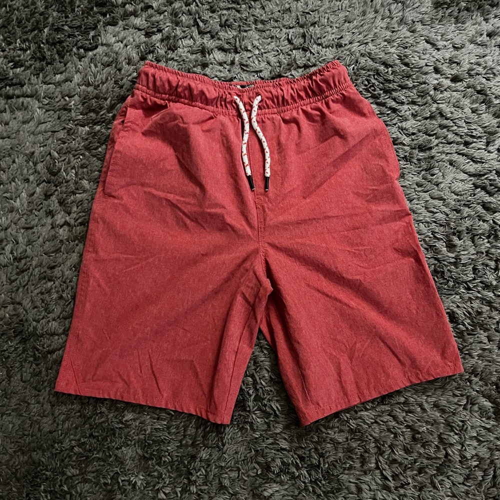 Boys size 10/12 board shorts in excellent condition. First Wave brand - Dillards